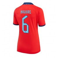 Camisa de Futebol Inglaterra Harry Maguire #6 Equipamento Secundário Mulheres Mundo 2022 Manga Curta